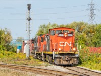 The 0700 Yard Job, led by CN 1412, nears the diamond with the CP Beach Branch on CN's N&NW Spur. CP had just cleared the diamond 15 or 20 minutes prior, and the crews had detailed for each other their respective plans for the day - always a helpful conversation to overhear.