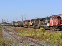 These days catching one yet two of CN's original Dash-9's is hard enough to do, then throwing in the very first SD70I is certainly something worth a chase. Not happy with a back lit shot at Stewartown I some how managed to beat the odds and catch 570 again at Mount Pleasant. Here we see consecutive Dash-9's 2508 and 2507 bracketing SD70I 5600 as they head for Toronto yard.