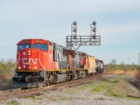 CN Yager is a spot I find myself at on pretty much every trip to Niagara. The southbound angles <a href="http://www.railpictures.ca/?attachment_id=42244" target="_blank">over the bridge</a> or <a href="http://www.railpictures.ca/?attachment_id=40843" target="_blank">under the signals</a> are both pretty predictable and easy shots. The northbound angle however was one I had yet to explore. As I have mentioned previously, 531/530 were cancelled for a while this Spring/Summer, and the duties were handled by 562/561. 562 was going over the border into Buffalo earlier than 531, and thus 561 was returning earlier than 530 normally would. This meant opportunities for shots on the return trip <a href="http://www.railpictures.ca/?attachment_id=42808" target="_blank">such as at Duff</a>, and <a href="http://www.railpictures.ca/?attachment_id=41320" target="_blank">other locations on the Stamford Sub</a>. This was the only shot I'd manage this summer of a northbound here. You can clearly see the third crew member in the trailing unit - a product of physical distancing. The track at right is the Humberstone Spur.