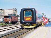 In September 1996, VIA Rail had launched the testing of two IC3 Flexliner demonstrator sets on some of their routes throughout Ontario. These new units were designed and built by ADtranz, which was a new company spin-off created from ABB and Daimler-Benz. These two trainsets entered revenue service on September 29, as it was concurrent with the release of the new VIA Rail system timetable that touted the trains as a “commuter service.” However, just as quickly as they began service they were removed on September 30 as they were found to not be reliably activating track circuitry due to their light weight. Eventually, after 7 weeks of further testing and modifications they were deemed fit to return to service where they operated on assignments from Toronto to Ottawa, Stratford, London and Niagara Falls in various schedule rotations. One set would operate until March 1997 and the other stopped running in early May. In the end, the tests were reportedly not successful and VIA Rail felt the technology would not “fit their needs.” 
<br>
Here, VIA Rail officials had rolled-out the blue carpets for an official unveiling at the Kitchener station during a weekday afternoon. This trainset was on display for several hours before heading west to Stratford later in the evening on the Guelph Subdivision. 
