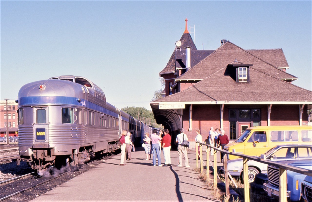 MEDICINE HAT MOMENT. Continuing westward on their first transcontinental train journey, the photographer and his girlfriend quickly detrain the Canadian at Medicine Hat on September 21, 1988 to stretch their legs during its ten minute stop. Having boarded at Ottawa on September 19th, they were exposed to some of the most amazing vistas that Canada had to offer with the best yet to come. Bringing up the rear on # 1 was the dome car Kokanee Park, where they spent most of their 2 day run admiring the beautiful Canadian countryside totally unobstructed.