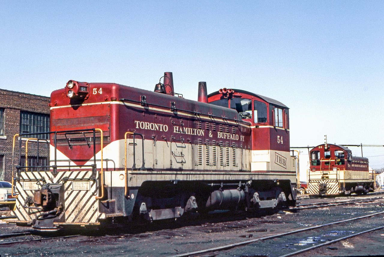 TH&B 54 and TH&B 58 are in the TH&B engine facility in Hamilton, Ontario on March 26, 1984.