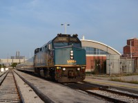 VIA 6409 sits under early morning light, with the Iconic GM Renaissance Center on the left from Detroit, Michagan, across the Detroit River, and on the right side Hiram Walkers factory, from the mid 1800s. Both Major staples of the region. A warm welcome sight to people coming to Windsor, and leaving the town.