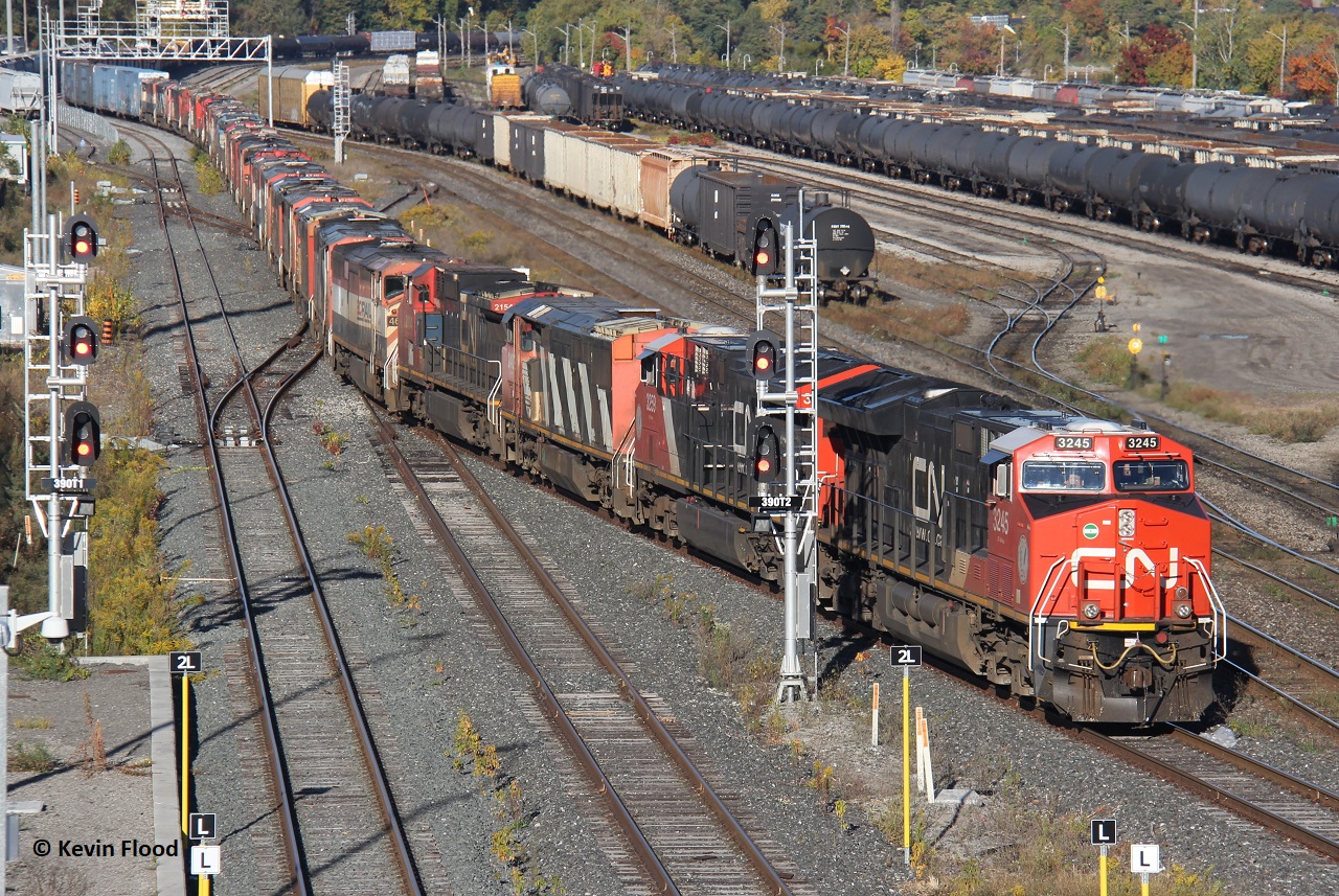 CN 421 cruises through CN Stuart in Hamilton with a whopping 25 engines dead in transit. This is a first, and perhaps last, for me. It was definitely an amazing sight to see!