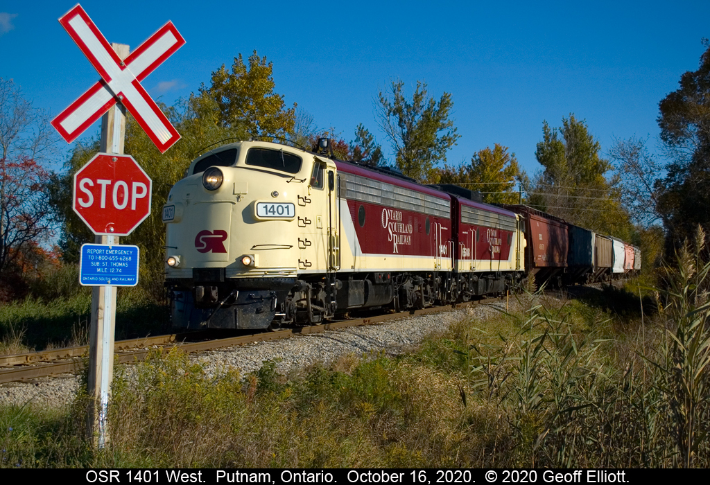 Well, of course I'll "STOP"....  With OSR 1401 now on point heading west, the Woodstock job pulls 6 hoppers of various lineage toward the large grain facility in Putnam, Ontario as it is about to cross Five Points Road.