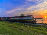 BCOL 4622 leads eastbound train 406 at sunset, heading along the Kennebacasis River at Renforth, a few miles outside of Saint John, New Brunswick. Nice to see some of the cowls haven't been scrapped...yet. 