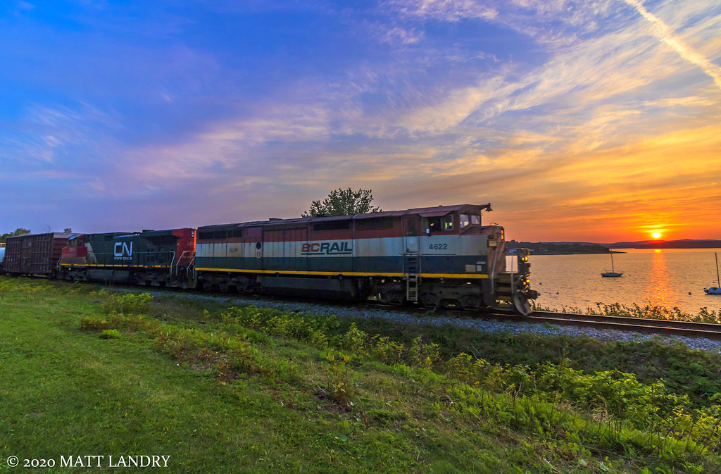 BCOL 4622 leads eastbound train 406 at sunset, heading along the Kennebacasis River at Renforth, a few miles outside of Saint John, New Brunswick. Nice to see some of the cowls haven't been scrapped...yet.