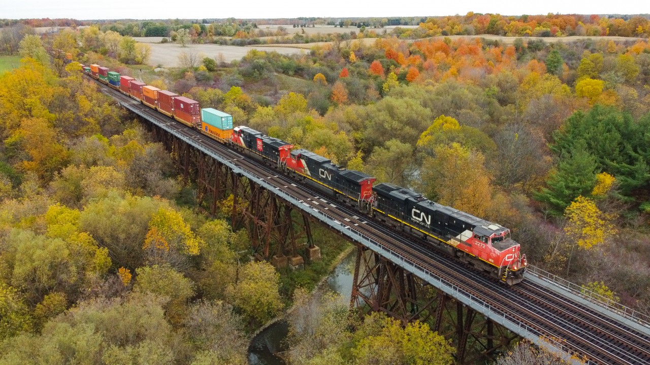 CN 147 crosses the Fairchild Creek Bridge with a trio of GE products providing the power for this long intermodal for Chicago.
