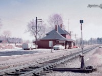 In response to Aidan Szabo's recent posting <a href=http://www.railpictures.ca/?attachment_id=43134>looking North</a> from Nashville Road at Kleinburg, I thought I'd submit the view looking South from there almost 47 years ago.  The CPR Kleinburg station, built circa 1908, and much closer to Nashville than Kleinburg, served as a station until 1964-65 when it was retired.  At that time it became a private residence until the CP wanted it removed from the property sometime in 1976.  As noted in <a href=http://www.railpictures.ca/?attachment_id=38379>Alan Pittman's post,</a> the station was relocated to a spot on Islington Avenue near Kleinburg Public School where it <a href=http://www.trainweb.org/oldtimetrains/CPR_Bruce/stns/Kleinburg_P.jpg>remains today beautifully restored.</a>