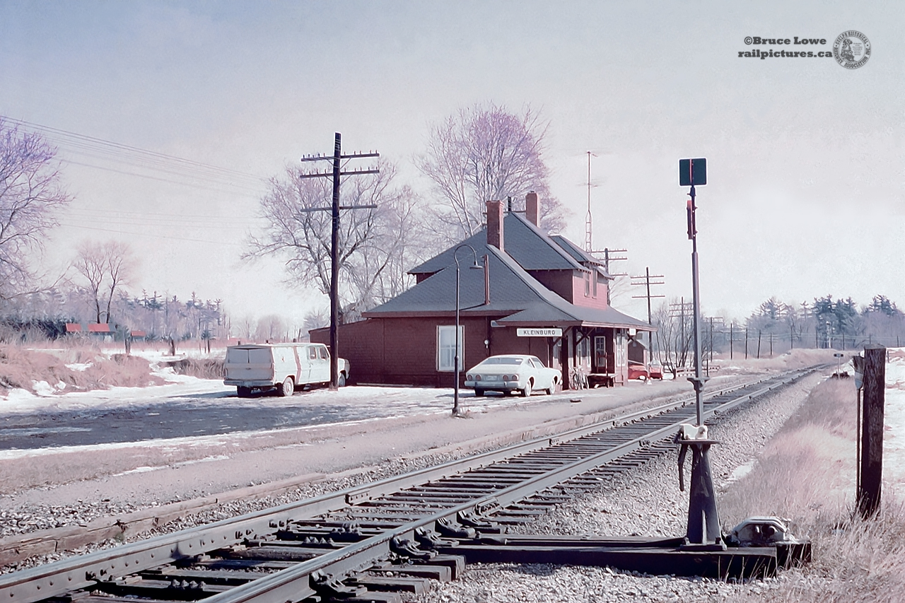 In response to Aidan Szabo's recent posting looking North from Nashville Road at Kleinburg, I thought I'd submit the view looking South from there almost 47 years ago.  The CPR Kleinburg station, built circa 1908, and much closer to Nashville than Kleinburg, served as a station until 1964-65 when it was retired.  At that time it became a private residence until the CP wanted it removed from the property sometime in 1976.  As noted in Alan Pittman's post, the station was relocated to a spot on Islington Avenue near Kleinburg Public School where it remains today beautifully restored.