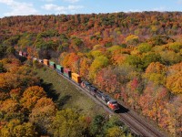 On a lovely October afternoon CN 146 is pictured coming downgrade at Dundas amid the spectacular fall colours.  With the Dundas Peak being made into a pay per visit and reservation spot to go to, the drone came in handy here to capture the colours from a new angle.  