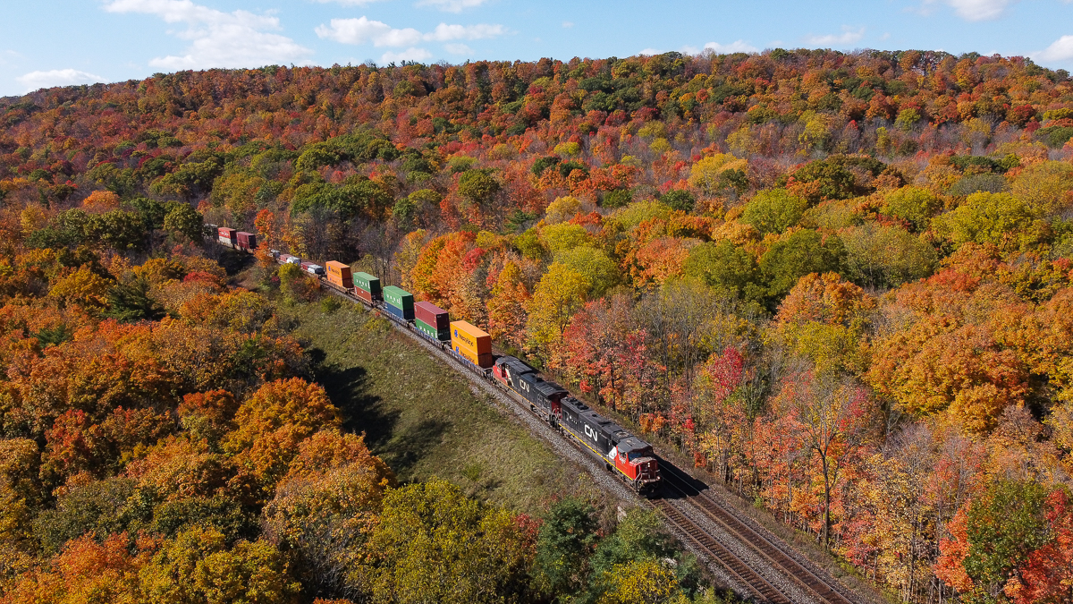 On a lovely October afternoon CN 146 is pictured coming downgrade at Dundas amid the spectacular fall colours.  With the Dundas Peak being made into a pay per visit and reservation spot to go to, the drone came in handy here to capture the colours from a new angle.