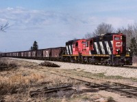 The 4343, in just a few more car lengths, will leave the Coronado Sub. and take the connecting track to the Lac La Biche Sub. It will continue north with the 25+ ballast hoppers to the point where the line re-hab work is being done. The track in the foreground is the Kerensky siding. Quite often during the summer months it is stuffed with various types of track equipment etc.