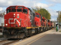 CN L568 is seen building it’s train at Kitchener, Ontario on the Guelph Subdivision with an impressive consist. It included; 4790, 9416, 4725, 4784, 7083 and 4796. October 14, 2019. 