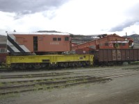 Further to the recent Bruce Lowe photo - Collection of the GHRA showing CN 50008 Bucyrus Erie 250 ton steam powered wrecking crane, serial number 36210, built in 1946, here is a glimpse of the same crane 37 years later at 56 years old in Kamloops, BC on August 1, 2002. In this photo the crane is now dieselized, has all new sheet metal wrapping the upper structure rotating deck, and is in the newest CN wrecking crane paint scheme.