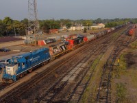 CN L580 holds the South Main at Brantford with GMTX 2323 CN 4726 CN 2675 and 109 cars bound for Garnet Yard and then Nanticoke.<br><br>With the Aboriginal Blockade lifted from the tracks after 2 weeks of closure, CN wass running trains through to Garnet in Daylight only to ensure safety of all, this move only lasted a few days.