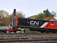 CN road repair works to change out traction motor #4 on GP40-2W 9525 at Brantford this afternoon