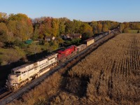 CP 247 breaks the silence in rural Carlisle as the last rays of sun light up my scene.  Leading this train was CP 7021, the sand colours that are applied to army vehicles serving in the arid regions.  