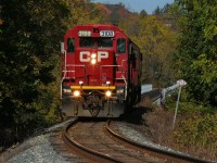 Canadian Pacific’s Hagey Job with GP38-2’s 3108 and 3118 are returning back to Cambridge having just crossed the Grand River Bridge and are approaching Riverbank Drive. The pair had set off cars for CN at the interchange at South Junction in Kitchener before departing light power to Hagey yard. 