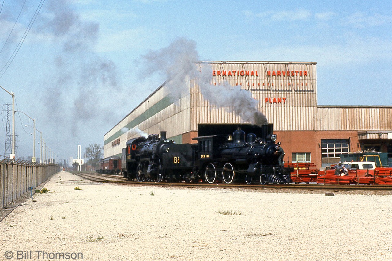 Ontario Rail Association's former CP 4-4-0 136 and 4-6-0 D10h 1057 (lettered for Credit Valley Railway) get serviced inside the International Harvester plant grounds off Burlington Street in Hamilton during May 1974, with some of ORA's other equipment stored in the background. They may have been here to use the old IHC steam facilities from when IHC ran ex-CN steam switchers to switch their plant in the 1950's.

Today, both 136 and 1057 are now at the South Simcoe Railway in Tottenham.