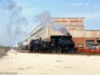 Ontario Rail Association's former CP 4-4-0 136 and 4-6-0 D10h 1057 (lettered for Credit Valley Railway) get serviced inside the International Harvester plant grounds off Burlington Street in Hamilton during May 1974, with some of ORA's other equipment stored in the background. They may have been here to use the old IHC steam facilities from when IHC ran ex-CN steam switchers to switch their plant in the 1950's.
<br><br>
Today, both 136 and 1057 are now at the South Simcoe Railway in Tottenham.