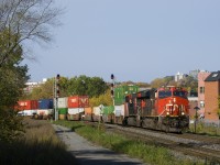 CN 2815 & CN 3239 are the power on CN 120 as it rounds a curve in St-Henri, the third of three eastbounds during a half hour period (with CN 306 and CN 324 ahead).