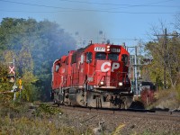 CP 4407 leads the charge East with hoppers in tow for Canpa. Today was a nice change of pace from the rather dreary weather in Southern Ontario, overall, probably the best shot so far of the month, especially scratching off another oddball unit. 