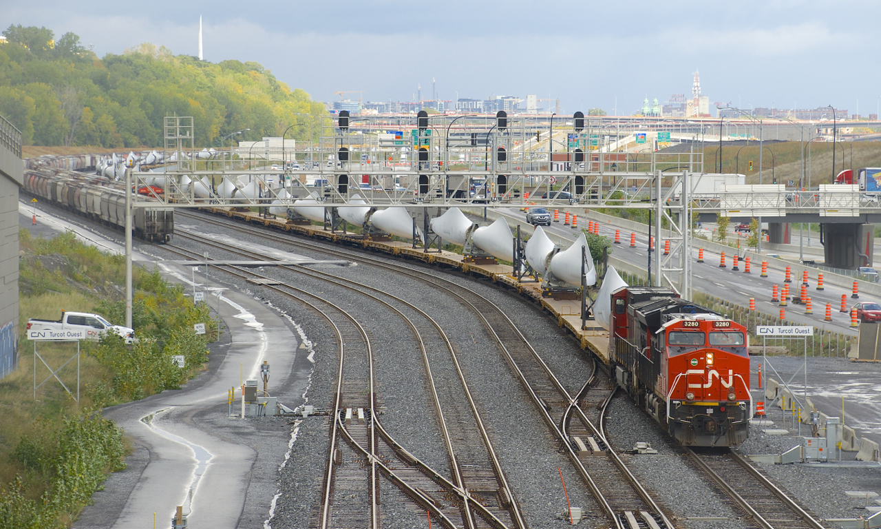 Windmill train CN X319 is stopped at Turcot Ouest as it gets recrewed. It has CN 3280 & CN 2613 for power