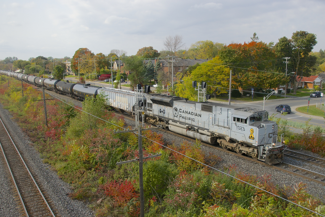 The Air Force unit (CP 7023) leads ethanol train CP 650 past a set of signals on CP's Vaudreuil Sub, with heritage unit CP 7013 bringing up the rear. This was a surprising lashup, as this train had GE units into Toronto, where power was swapped (not a particularly common occurrence for this train).