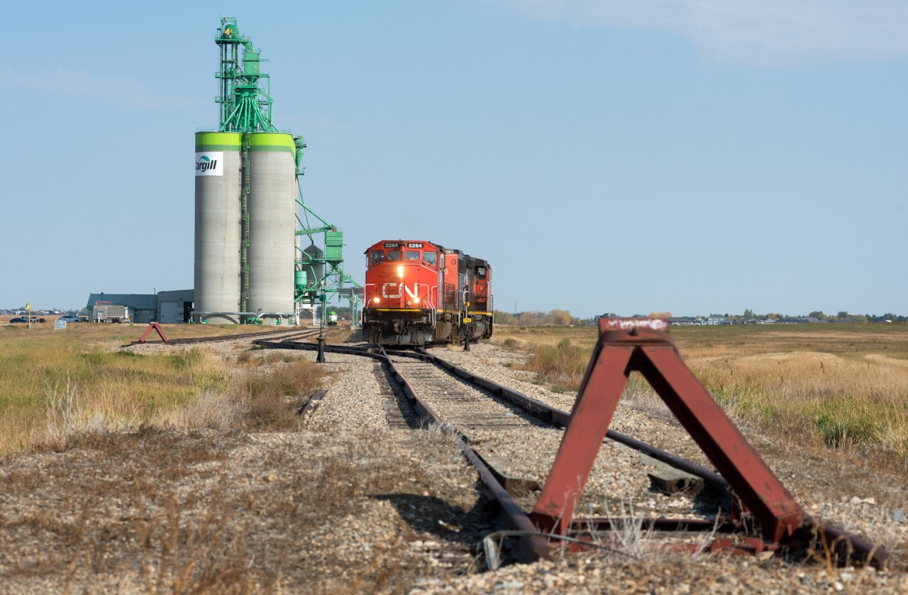 Train 556 has reached the end of what remains of CN's Central Butte Subdivision at Moose Jaw. After spotting their train of 100 grain empties at the Cargill facility they will return to Regina (44 miles to the east) light power.