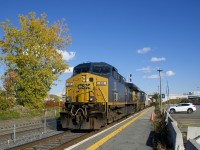 CSXT 131 & CSXT 862 lead CN 327 through Dorval Station.