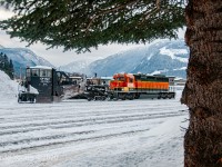 The yard in Revelstoke is getting a much needed cleaning. Assisting in the spreading operation with Jordan Spreader CP 402889 are a pair of visitors in the form of CITX 3036 (and CITX 3008 out of frame). A pair of SD40-2's with obvious Burlington Northern heritage. The amount of snow that falls over the winter season in Revelstoke and area mountain passes is incredible with plow and spreader operations frequently being called to clear the rails of the Mountain and Shuswap Subs. <br><br> 
<i>Roster Note: CITX 3036 would be purchased by Norfolk Southern a couple years later and become NS 3501, being painted up in an Operation Lifesaver scheme. It was removed off their roster by 2020- disposition unknown to me.</i>