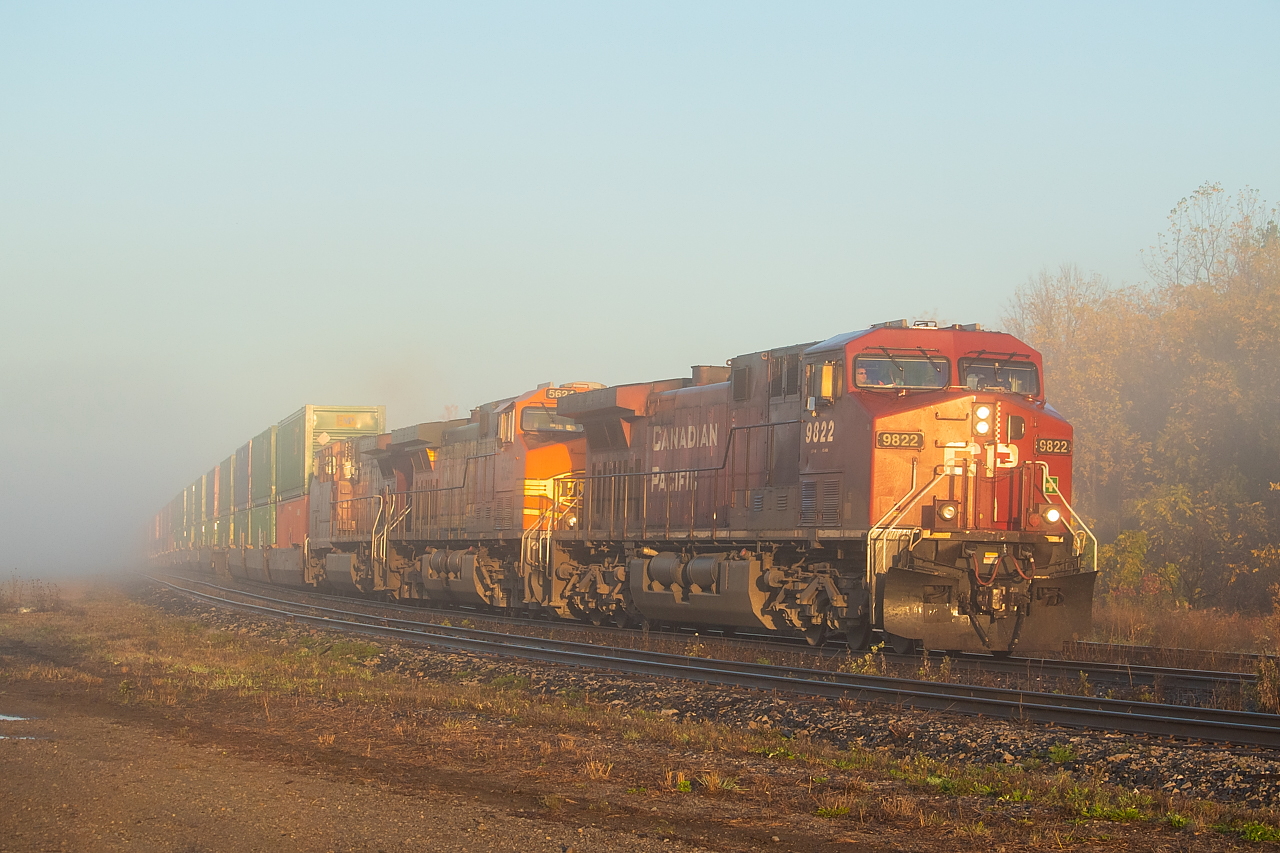 CP 143 emerging out of a thick fog that was slowly burning off as the sun rose on a beautiful Friday down in Niagara.