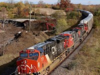 While I wasn't overly optimistic about the days weather, meeting up with a good Railfan friend for the day at least was something to look forward to. Luckily we we pleasantly surprised and had sun most of the day along with a few trains. I don't often get train 397 and it was nice at least having a Dash-8 mid consist. The view off Garden Avenue was definitely worth the climb as CN 397 stormed around the curve.
