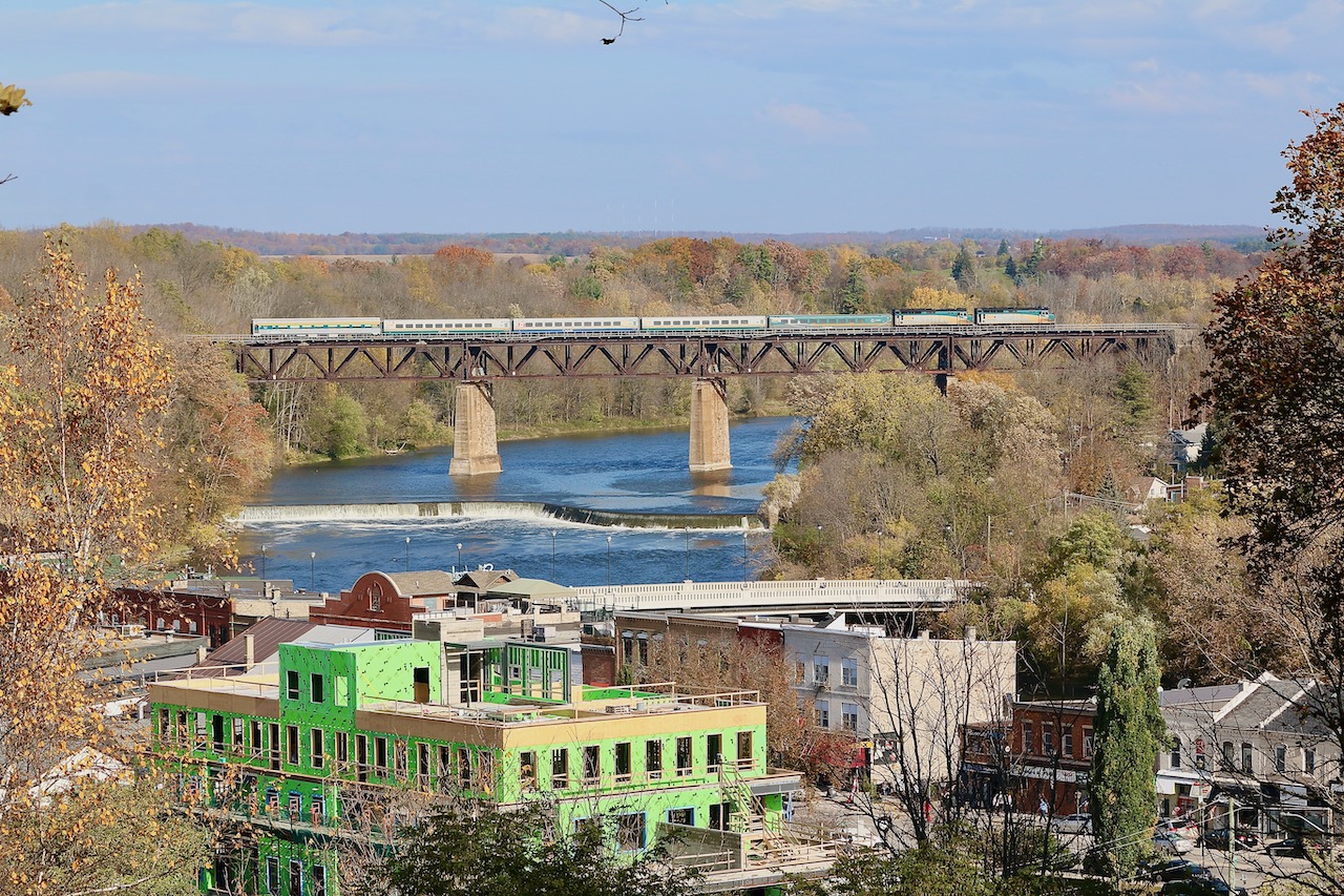 An interesting double headed VIA 72 with an interesting painted BUDD car trailing, blast its horn for trespassers at the end of the Grand River bridge at Paris. By this date most of the fall colours that remain on the trees look more burnt than vibrant, but nevertheless any image taken from the look out here looks impressive.