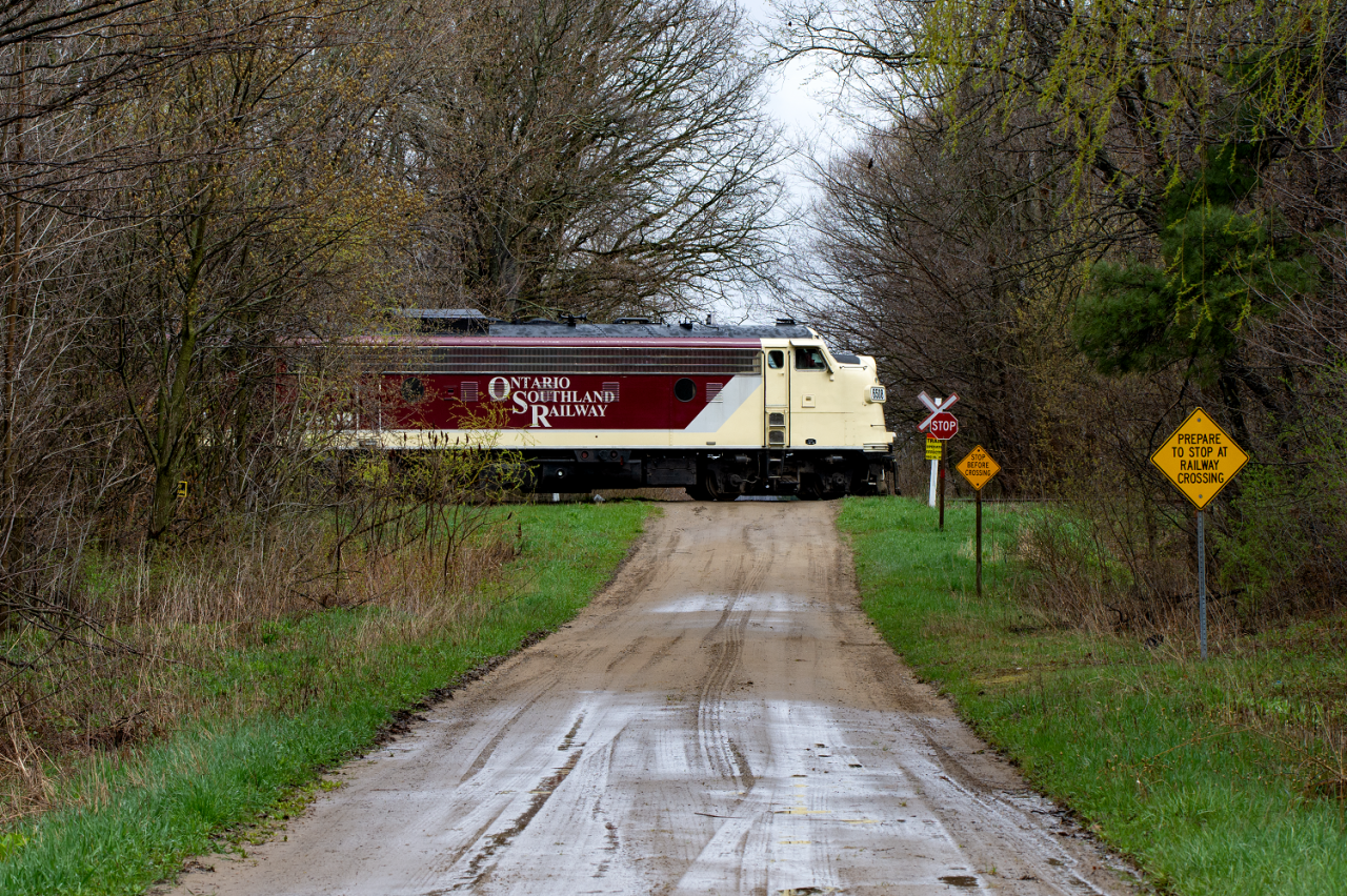 One of Ontario Southland's prized possessions are their F units. Here we see OSR 6508, one of 3 F units they own crossing a lesser travelled dirt road on their way towards Tillsonburg. After just under 4 years of running the former Canada Air Line for CN, with bridge repairs needed along the line and the funds just not there to justify continuing service the once shortcut across Southern Ontario is now just a memory. The train making the return trip back to St. Thomas would be the last time a train has crossed this crossing since.