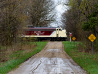 One of Ontario Southland's prized possessions are their F units. Here we see OSR 6508, one of 3 F units they own crossing a lesser travelled dirt road on their way towards Tillsonburg. After just under 4 years of running the former Canada Air Line for CN, with bridge repairs needed along the line and the funds just not there to justify continuing service the once shortcut across Southern Ontario is now just a memory. The train making the return trip back to St. Thomas would be the last time a train has crossed this crossing since. 