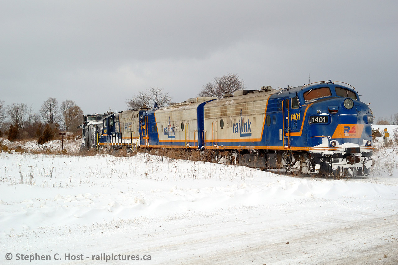 This was my first plow chase, and to say it was a great one is an understatement. With three matching RLK units it didn't matter if you shot the train coming toward you , or going away. With a bit of sun peeking through the angry skies, the extra is westward bound entering Goderich town limits as they have plowed northward from Clinton Jct. They will return to Clinton, wye, then plow south and I chased both ways. Despite the white knuckle drive it was so worth it. Thanks to a friend for the heads up, you know who you are!
Both of these F units ended up on OSR and they only ran together for an OSR plow in RLK paint once . I had to be there of course. More to come.