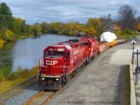 Rolling along the Speed River, CP T97 has a 320,000 lb pressure vessel in tow from BWXT in Galt, destined for Goderich and ultimately Bruce Power's nuclear generating station in Douglas Point (Tiverton) Ontario. This $642 (CDN) million contract for 32 vessels will last for 10 years and this is only the third unit that has been shipped out. Three railways participate in the 84 rail mile move, CP 10 miles from Galt to South Junction, CNR 28 miles from South Junction to Stratford, and GEXR 46 to Goderich. A special unloading ramp has been constructed in Goderich to unload the vessels where trucks will complete the last 50 miles of the journey by road.<br><br> Curiously, CN could haul from Galt directly to Stratford but since the takeover from GEXR (where GEXR said hold my beer and hauled it the whole way) they seem to have essentially abandoned the Fergus sub south of Eagle St, despite the tracks still in place and GEXR last doing this 3 years ago - allowing CP to originate the load and share in the revenue. A lucky catch as I had no idea this was happening, I was driving around bored and chose to follow the CNR and CPR Branchlines in Kitchener and managed to find them just as they were lifting it.. thank god CN wasn't running or I'd never have made it :)