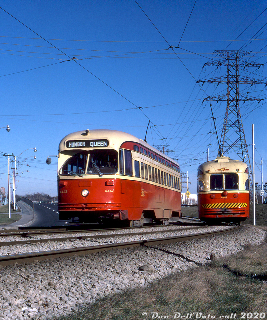 TTC PCC 4463 (1949-built A7-class) heads west along the Queensway private right-of-way, passing A6-class PCC 4386 on the curve just west of the Humber River bridge.

Original photographer unknown, Dan Dell'Unto collection slide.