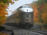 VIA Rail train #1, the Canadian, with 6435 and 6434 has completed their station stop at the historic Parry 
Sound station on Canadian Pacific’s Parry Sound Subdivision. Here the train is seen exiting town as it continues it's Northern Ontario jounrey through the speldid fall colors during some continous rain showers. 
