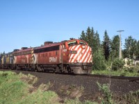 Peter Jobe photographed VIA's "Canadian" headed by CP 1424 as it crossed the Little Sturgeon River in Sturgeon Falls, Ontario at 7:00 P.M. on June 27, 1980.