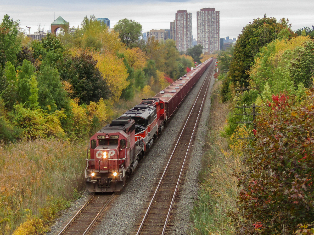 CP 3-GPS-10 makes it's way EB past Mile 202.1 of the CP Belleville sub with CP 5936, CMQ (Bangor and Aroostook heritage unit) and CP 6067. The fall colours are finally showing up and for once, I'm thankful for clouds as this would have been horrendously backlit in the mid autumn evening.