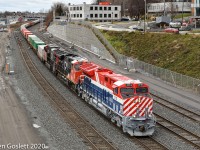 Montreal - Halifax intermodal train #120 at Turcot West led by CN's BC Rail heritage locomotive.