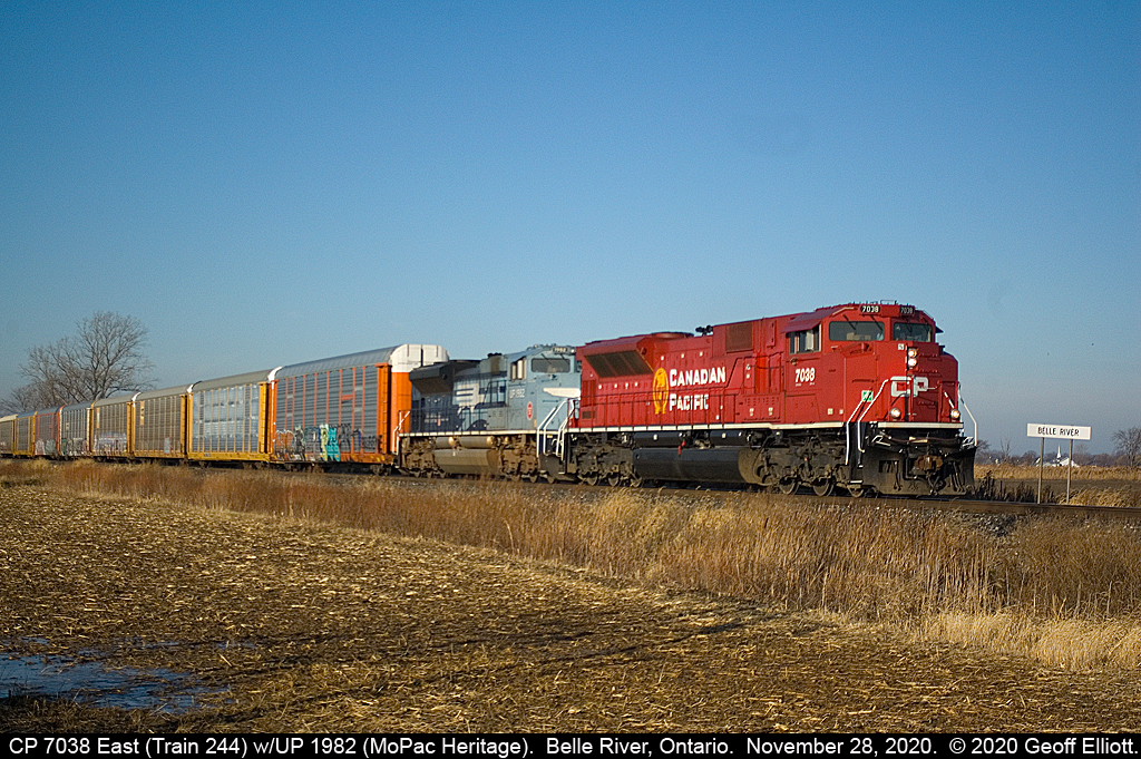 CP Train #244, with SD70Acu #7038 on point, speeds through Essex County on a brisk and sunny November 28th.  The draw today isn't the leader, but the trailing unit, Union Pacific #1983, the Missouri Pacific Heritage Unit.  First one of the UP Heritage fleet I've been able to shoot as the Rio Grande unit went by in the dark a few years back.  Thanks to all for the H/U's.....