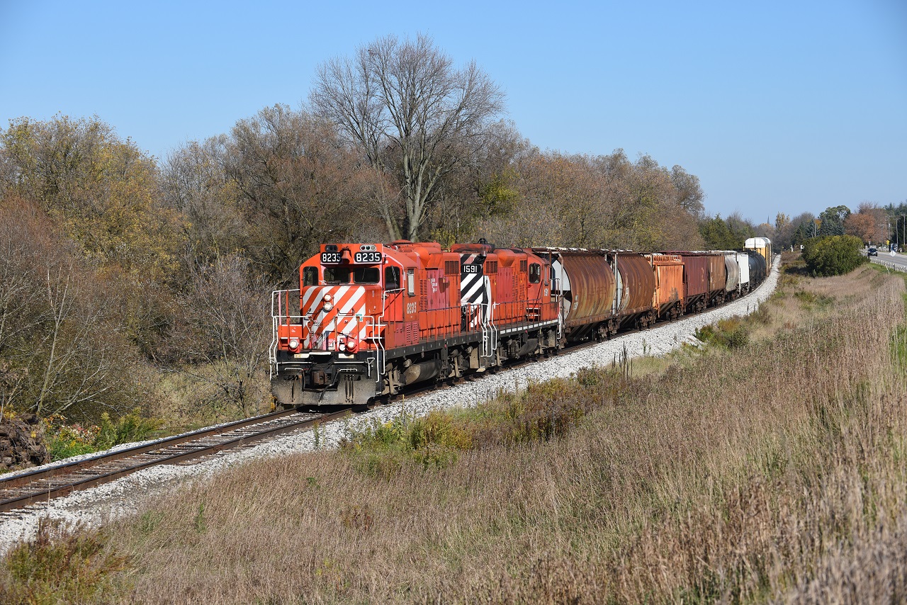OSR's pair of former action red CP GP9s head West to Ingersoll with interchange traffic from CP in Woodstock. What was a common sight in the 90s and even up to the mid 2000s can once again be recreated after 3-4 years of the 8235 and 1591 being split between the Salford and the Guelph Divisions