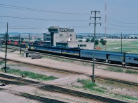 <br>
<br>
  how about your most interesting rail fanning Kodachrome* 'capture' ? This one is in my 'top ten' ….
<br>
<br>
 The July 6 Plan: Capture – on Kodachrome - VIA #9  prior to departure at Union, then capture #9 at the Snider diamond** on the Newmarket....
<br>
<br>
 ….except #9 took an unexpected detour....into Mac Yard !
<br>
<br>
 at CN MacMillan Yard:  VIA #9, Toronto section  of  'Canadian' ,  July 6, 1986 Kodachrome by S.Danko
<br>
<br>
What's interesting:
<br>
<br>
 at Union VIA#9 operating crew attempted to repair leaking steam line between the baggage and first coach....
<br>
<br>
 ….after some discussion the stop at Mac was arranged to allow the CN pipefitters to attend to the matter
<br>
<br>
 July 6 1986: VIA#9 power:  6502 - 6610 - 6612 - 6635  ( FP9A – F9B – F9B – F9B )
<br>
<br>
 VIA#9 and #10 were daily on the Newmarket Subdivision with scheduled passenger stops at Newmarket, Barrie, Orillia, Washago then north of Washago onto the Bala. 
<br>
<br>
  in the background: that CN lashup includes 9523 – 5039 – 95xx – 9449 – 4229 ( GP40-2L(W) /  SD40 / GP40-2L(W) /  GP40-2L(W)  / GP9 )
<br>
<br>
 * ok, ok, many of you have missed the joy ( & or dismay ) of waiting for that little yellow box...
<br>
<br>
 ** Snider diamond replaced, by Metrolinx , with a rail separation – Newmarket over the York Sub – completed 2007ish.
<br>
<br>
 perhaps those in the know may explain the inbound / outbound  trackage at the Mac tower ? ....
<br>
<br>
sdfourty