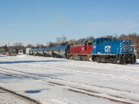 CEFX 1569 and NECR 3940 shuffle cars in the yard at Brantford on a bitterly cold February morning.  Both engines were in town to service the Burford Spur but would ultimately move around a bunch of cars for 597 that night before lifting the RLHH 3049 and heading back to Hamilton.  496 would return the next day to service Ingenia.