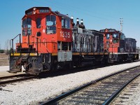 CN SW1200RS's 1335 and 1272 are seen stored and out of service at CN's MacMillan yard diesel shop in spring 1995. CN 1272 was possibly the last active SW1200RS in the original CN big noodle paint scheme. Both unit's would eventually be sold to Canac with 1335 later being sold to RaiLink. It would emerge as RLK 1201 and was assigned to RaiLink Southern Ontario where it would live on for several more years operating on assignments out of Brantford and Hamilton. 


