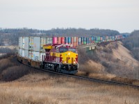 After sitting in the hole for a couple of hours CN 3069 on the point of Q117 makes the final leap into Rivers for a crew change. Although this attempt at the WC scheme isn't particularly anyone's favorite I must say it's pretty cool to see anything at all.